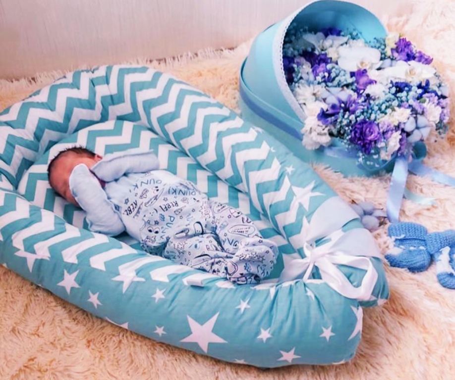 Использование гнездышка для новорожденного: для чего нужна подушка-кокон